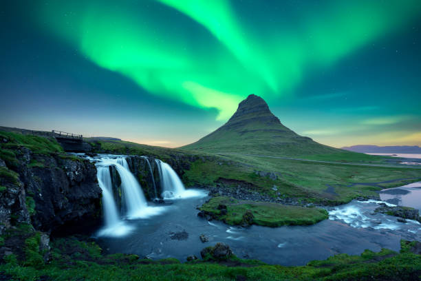 istock Aurora borealis Northern lights over Kirkjufellsfoss waterfall 2175886487