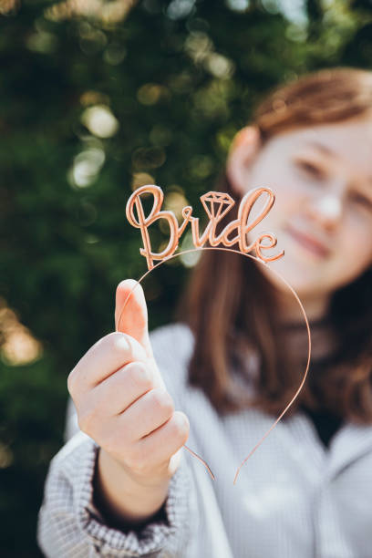 Female bride accessories, hair holder. The inscription bride on the headband. Female bride accessories, hair holder. The inscription bride on the headband. Wedding decoration, accessories for a bachelorette party, wedding hoop. Female hoop, hairpin for the bride to be party. hoops wedding stock pictures, royalty-free photos & images