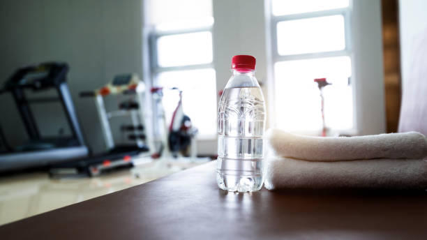istock Water and towels on the gym bench 2175890639