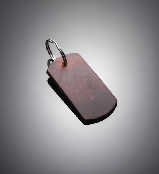 istock Stylish leather keychain on a black background 2175895660