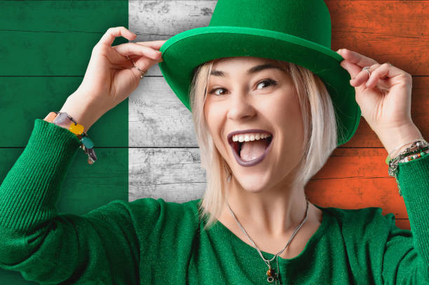 istock Smiling woman celebrates St. Patrick's Day. 2175899290