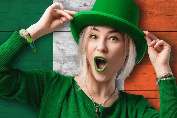 istock Smiling woman celebrates St. Patrick's Day. 2175900200