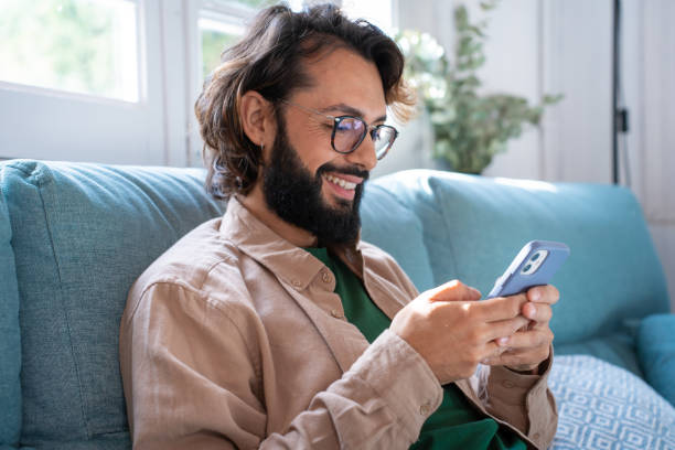 istock using cell phone hand holding texting message on screen mobile chatting friend 2175905534
