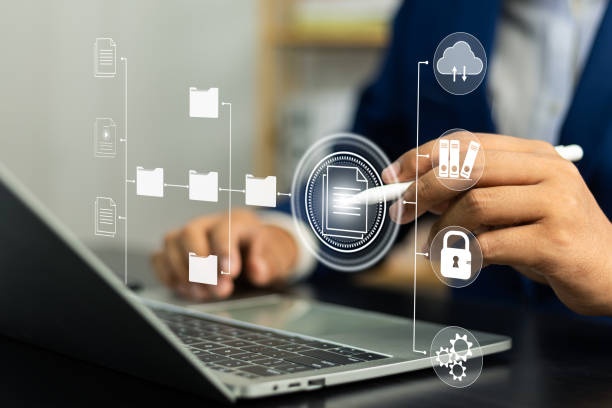 istock Document management system concept (DMS), Businessman working laptop virtual screen icons folder and document management system, Software for archiving, Searching and managing files corporate document 2175912255
