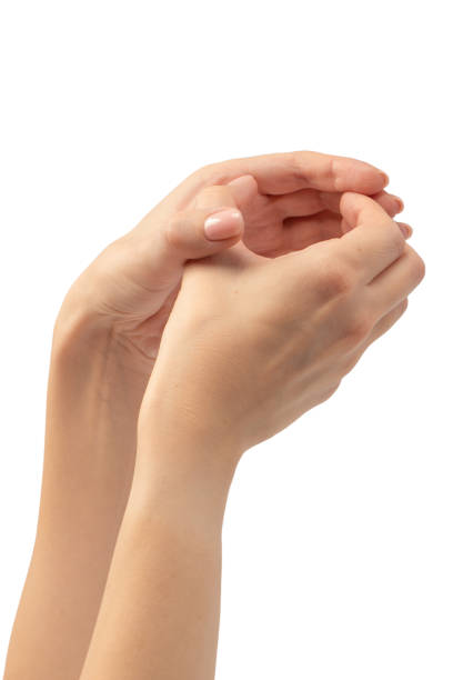 istock Woman hands with nude manicure isolated on a white background. 2175914913