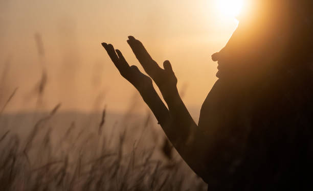 istock Muslim woman praying 2175920964