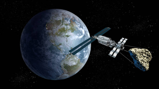 istock Satellite towing an asteroid near Earth 2175921396