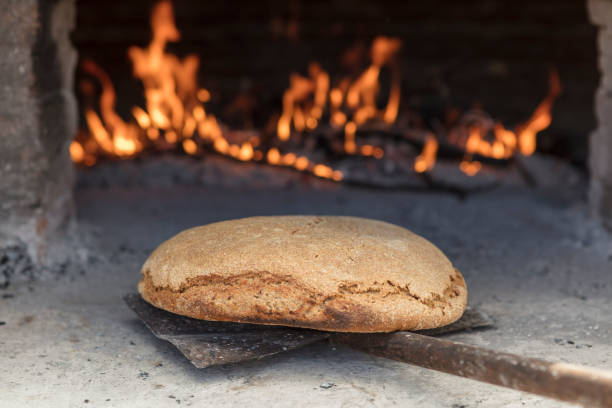 Round crusty homemade artisan sourdough rye  bread, home cooking