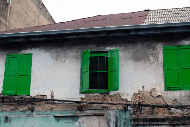istock old building with green shutters on the windows 2175935150