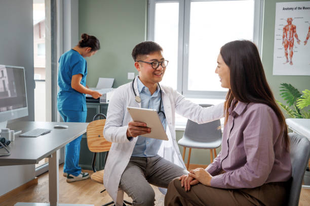istock Doctor talking with female patient at the office 2175941821