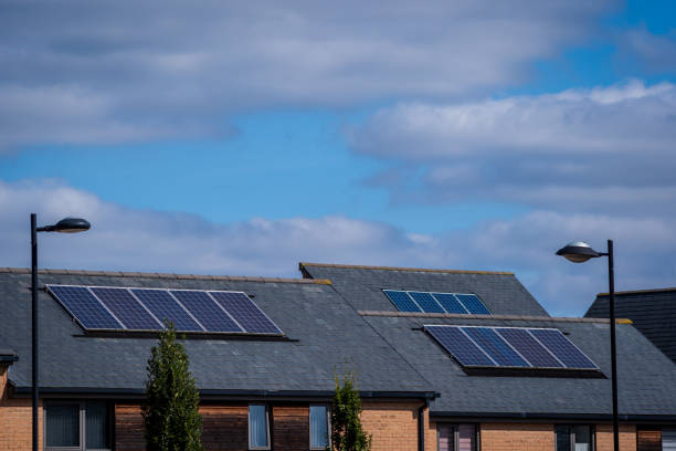 istock Solar energy panel on new built house roof in england uk 2175950084