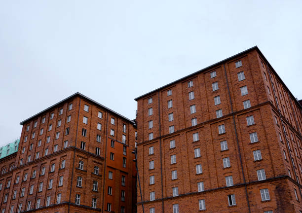 istock Low angle view of brick buildings against sky 2175951478