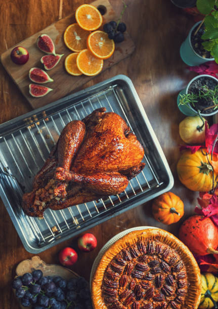 istock Preparing stuffed turkey with side dishes for Thanksgiving holiday 2175953152