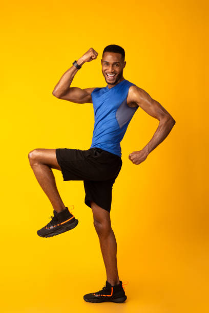 istock Young black sportsman walks highly lifting his knees 2175955449