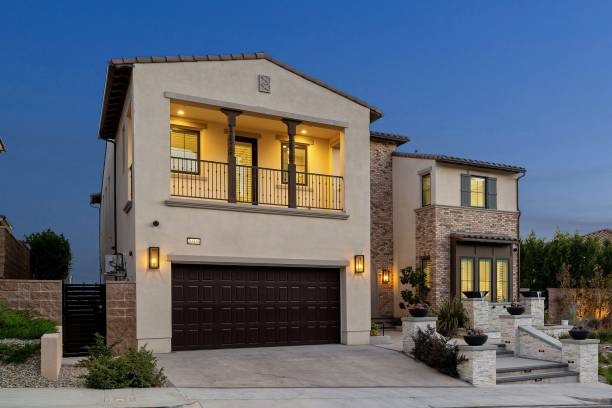 istock Modern two-story house at dusk 2175964516