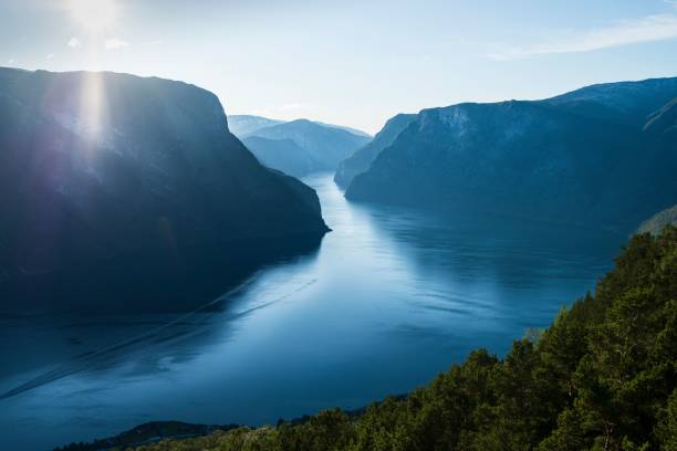 istock A beautiful fjord landscape with sunlit mountains. 2175965368