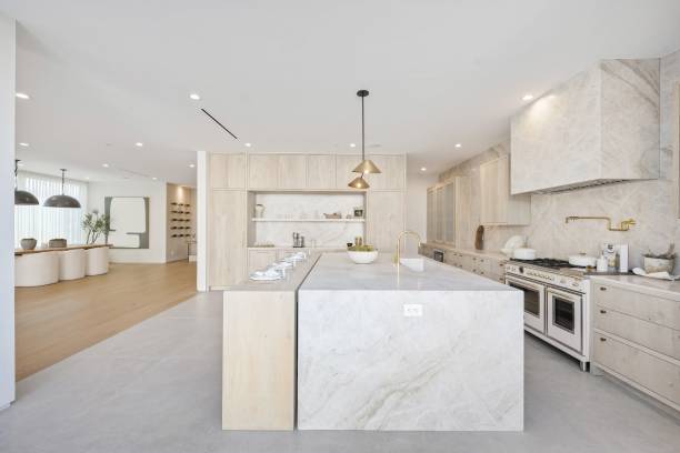 istock Modern and spacious kitchen with marble island and high-end appliances. 2175965658