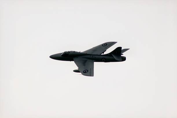 A Hawker Hunter T7 XL573 lane flying in the bright sky