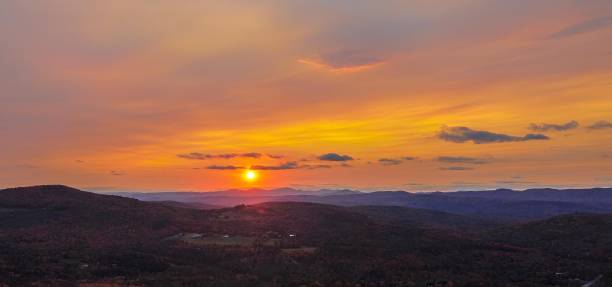 istock Breathtaking sunset over rolling hills and distant mountains. 2175966728