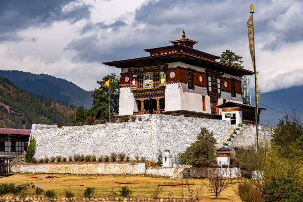 istock Traditional Bhutanese building with mountain backdrop 2175969189