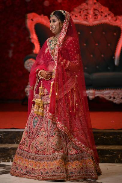 istock Indian bride in red bridal lehenga 2175969220