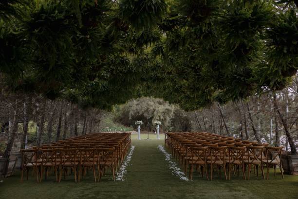 istock Outdoor wedding ceremony setup under a green canopy 2175969374