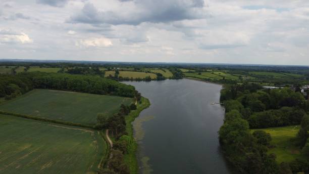 istock Aerial view of a river and green fields 2175970725