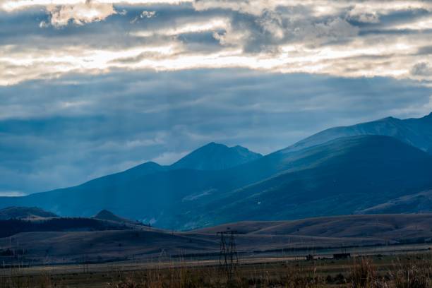 istock Dramatic Mountain Landscape with Sunlight and Clouds 2175971126