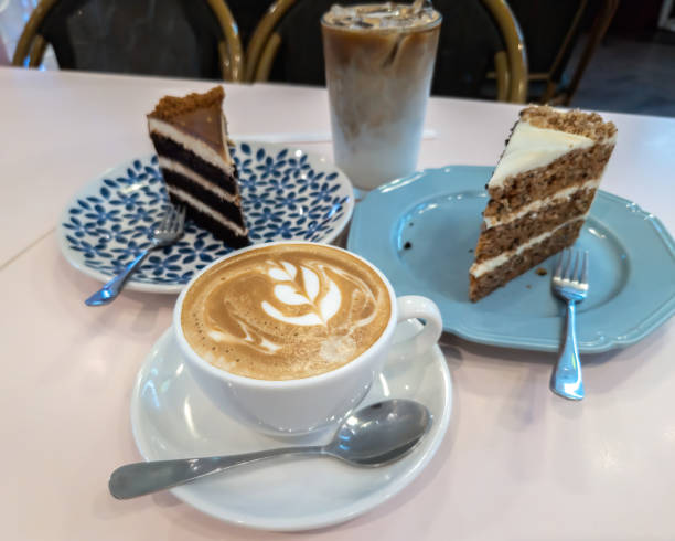 istock Cakes and cappuccino coffee are set out for tea time. 2175971559