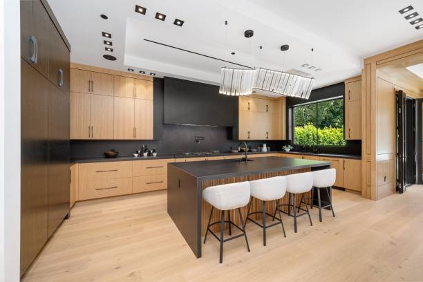 istock Modern kitchen interior with wooden cabinets and large island. 2175972406
