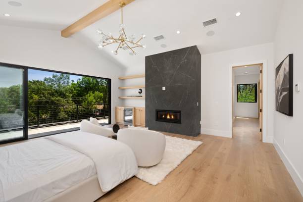 istock Modern bedroom with scenic view and fireplace 2175972551