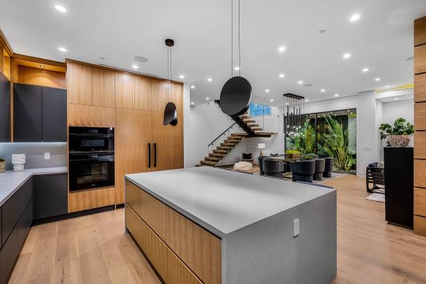 istock Modern kitchen and living area with stylish interior. 2175972575