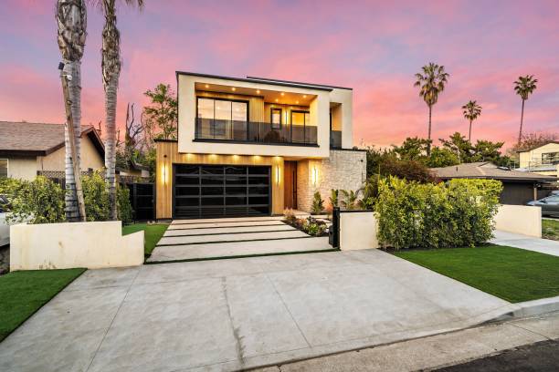 istock Modern two-story house at sunset 2175972627