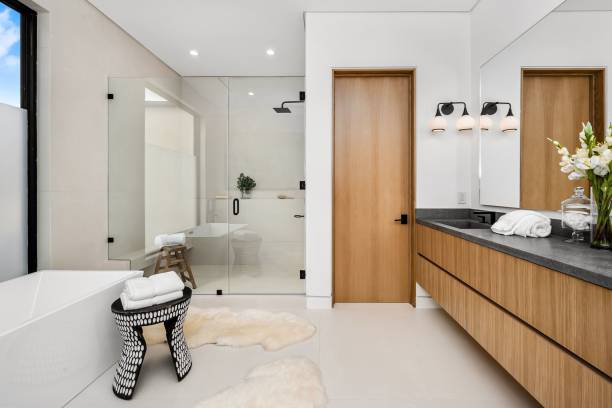 istock Modern Bathroom Interior with Wooden Accents 2175972656