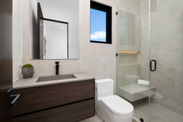 istock Modern bathroom interior with sleek design and natural light 2175972671
