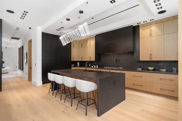 istock Modern kitchen with wooden cabinets and central island 2175972722
