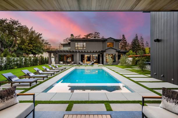 istock Modern luxury home with pool at sunset. 2175972733