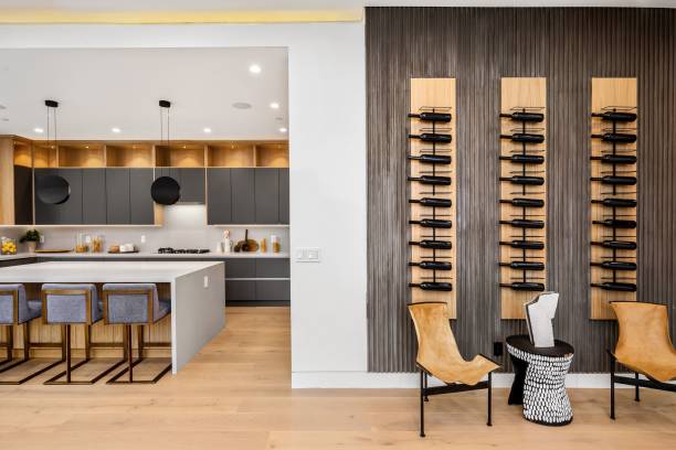 istock Modern kitchen interior with island and wine rack wall 2175972910