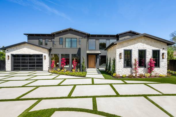 istock Modern luxury house with spacious driveway and garden. 2175973039