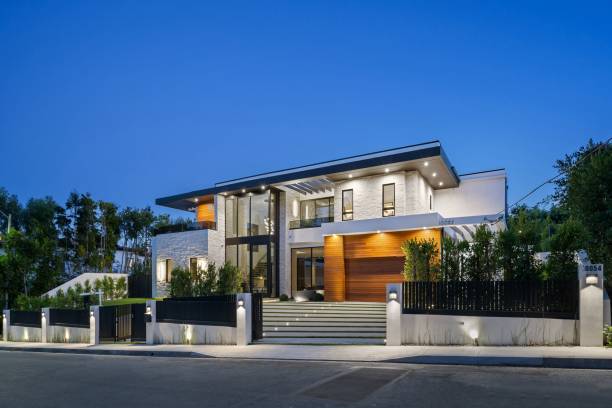 istock Modern luxury house exterior illuminated at dusk. 2175973060
