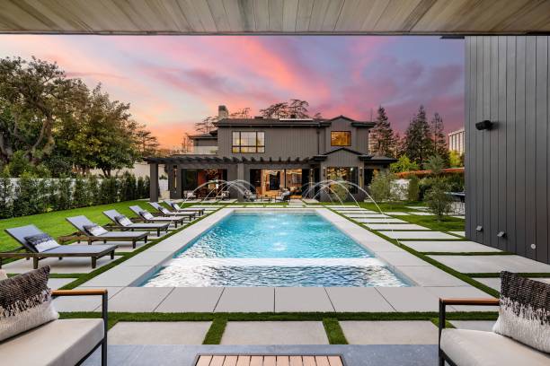 istock Luxury home with swimming pool at sunset 2175973090