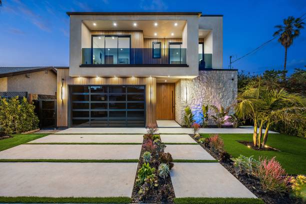 istock Modern two-story house with landscaped front yard. 2175973655