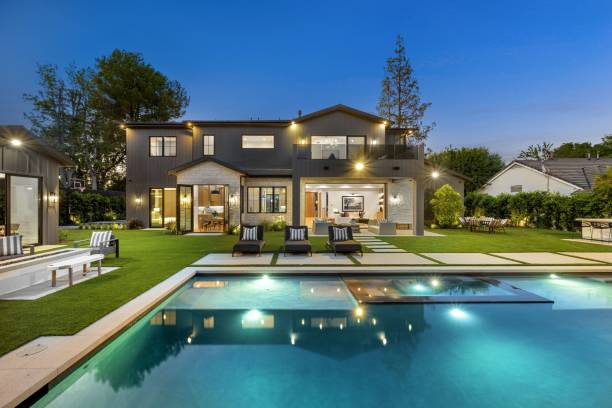 istock Luxurious modern house with pool at twilight. 2175973690