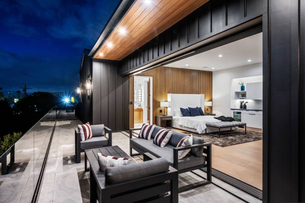 istock Modern luxury bedroom with open terrace at night 2175974233