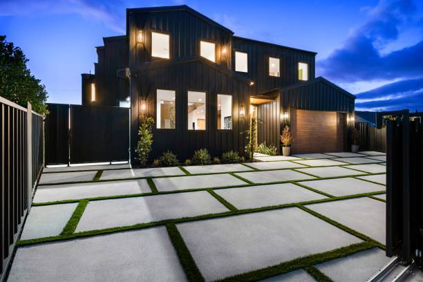 istock Modern house exterior at dusk with illuminated lights. 2175974259