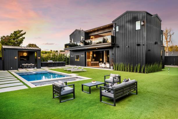 istock Modern black house with luxurious backyard 2175974282