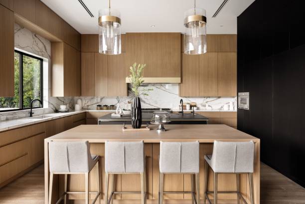 istock Modern kitchen with wooden cabinets and marble countertops 2175974545