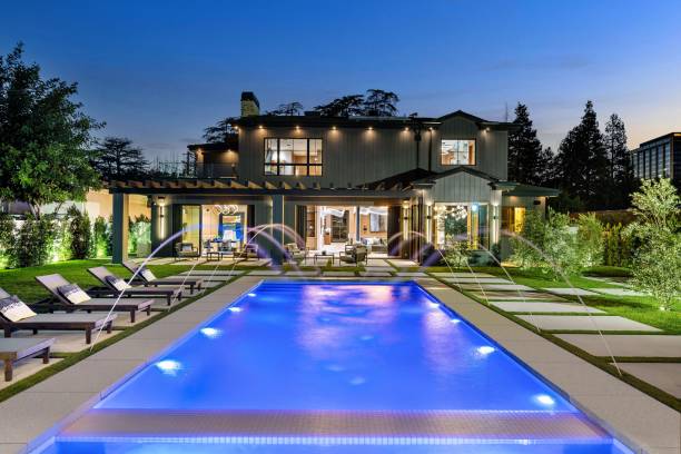istock Luxurious modern house with a swimming pool at twilight. 2175974694