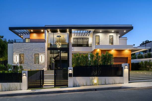 istock Modern luxury house exterior illuminated at dusk. 2175974701