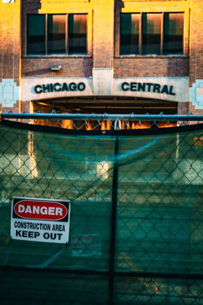 istock Construction site in front of Chicago Central building at sunset 2175975136